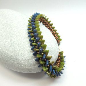 Handwoven blue green and copper bracelet